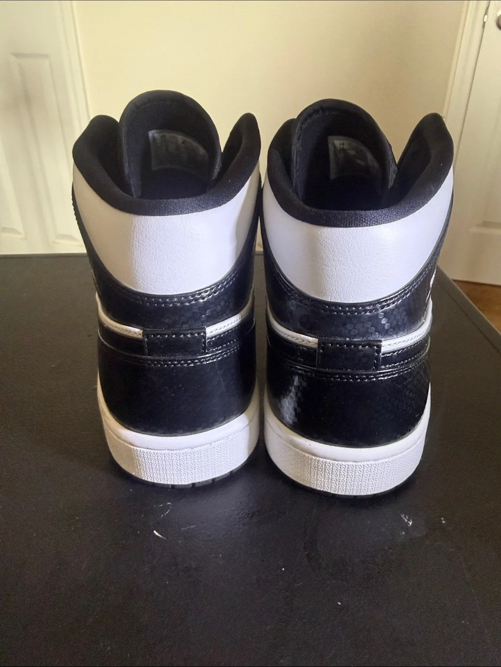 Jordan Black and White High-Top Sneakers